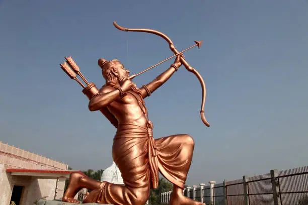 Photo of Statue in temple with bow and arrow