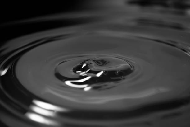 Splash Of Water Over Blue Background