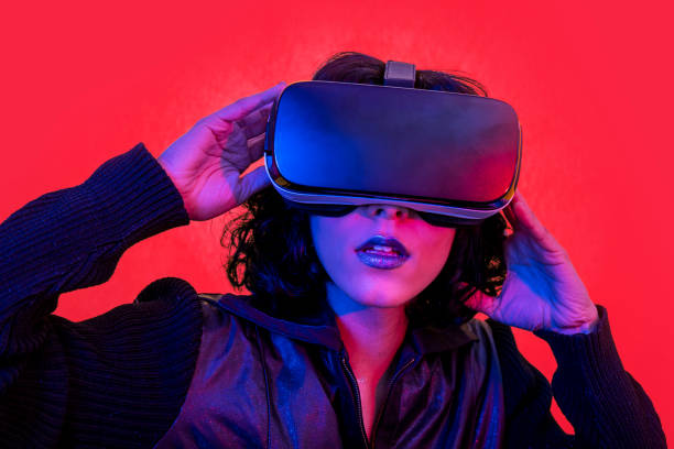 istock The young woman is using the virtual reality headset. 1388994352