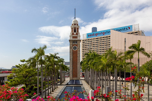 Hong Kong - March 31, 2022 : Hong Kong Cultural Centre and Former Kowloon-Canton Railway Clock Tower in Hong Kong.