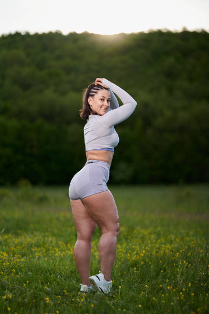 istock Plus size runner female in the forest 1388996675