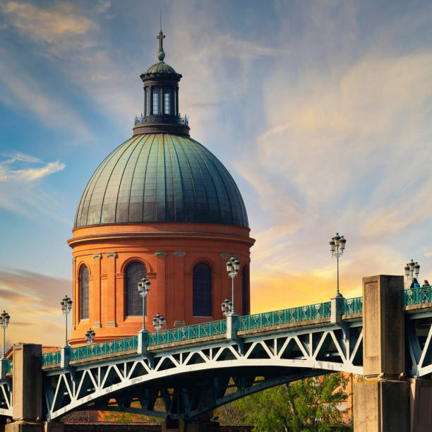 istock Famous view of Saint-Pierre bridge at sunset 1388996719