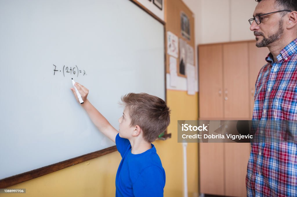 Boy Learning Problem School Teacher Observing School Boy Solving Math Problem Stock Photo ...