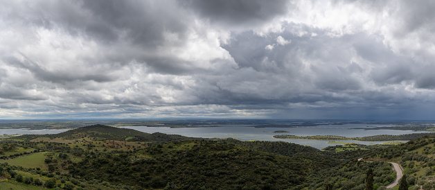 A panorama landscape view of the Alqueva Reservoir on the border of Spain and Portugal