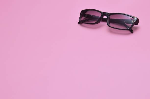 istock glasses on a pink background 1389003454