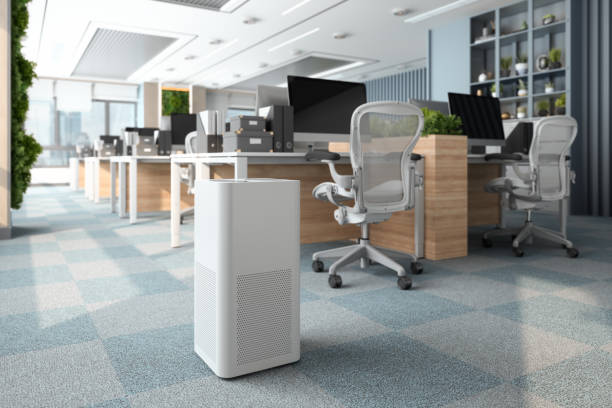 air purifier in modern open plan office for fresh air and healthy life - air quality 個照片及圖片檔