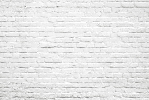 istock Old white brick grunge wall texture background 1389011458