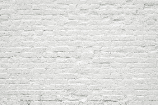 Old white  grunge brick wall texture background. Loft-style wall