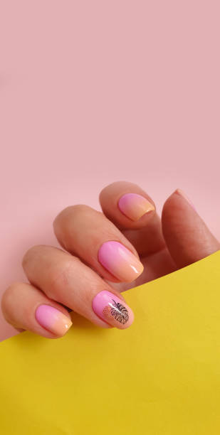 istock female hand beautiful manicure on a colored background 1389011729