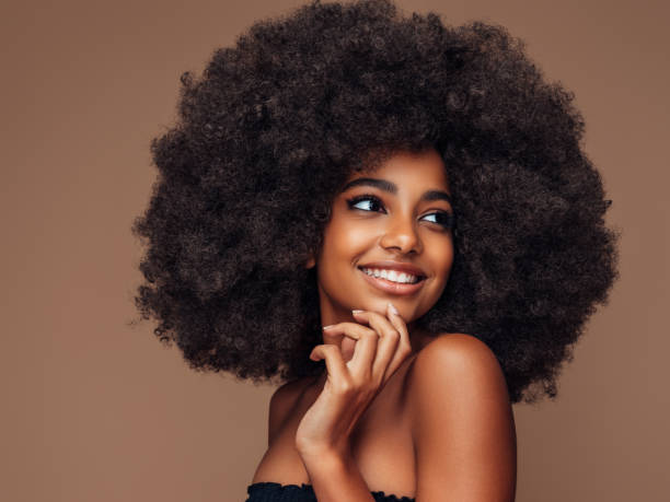 istock Beautiful girl with curly hairstyle 1389015347