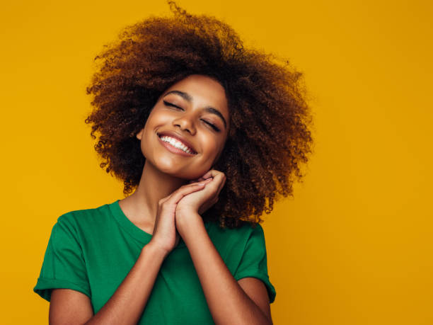 istock Beautiful afro woman 1389015377
