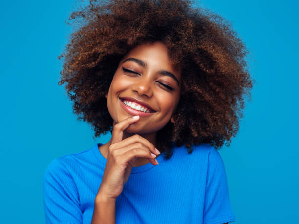 istock Beautiful afro woman 1389015500