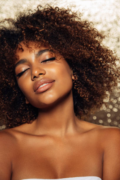 istock Beautiful girl with curly hairstyle 1389016506