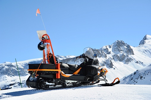 Snowmobile on the ski slopes of French alps