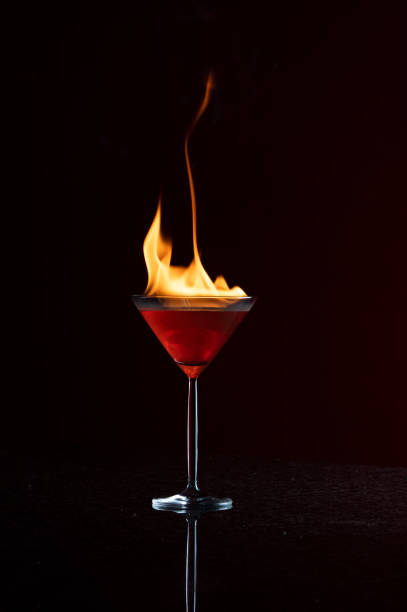 istock Burning flaming Martini cocktail cosmopolitan 1389021909