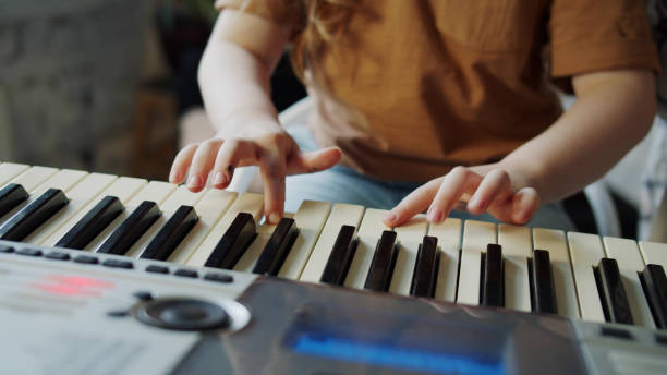 istock A child with his mother at a remote music lesson 1389022606