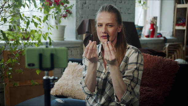 istock The woman is streaming about chess. She talks about pieces 1389027589