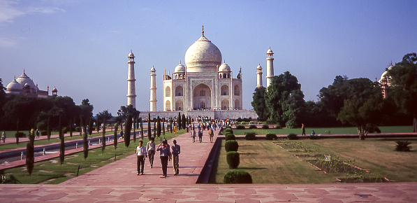 Agra, India - aug 9, 1996: a vast avenue and gardens lead to the Taj Mahal platform on the bank of the Yamuna river.   Vintage photo. Historical archive photo.