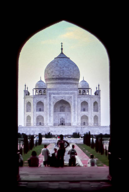 Agra, India - aug 9, 1996: Taj Mahal seen from the entrance door to the monumental complex.  Vintage photo. Historical archive photo.