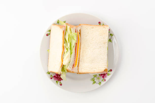 Mixed sandwich between whole grain bread.