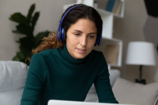 istock Hispanic woman study online on computer at home 1389032678