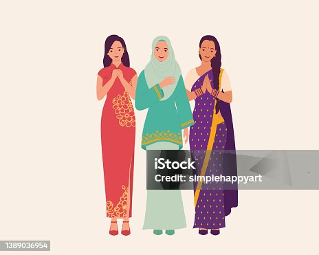 istock Women With Beautiful Traditional Clothes Greeting. 1389036954
