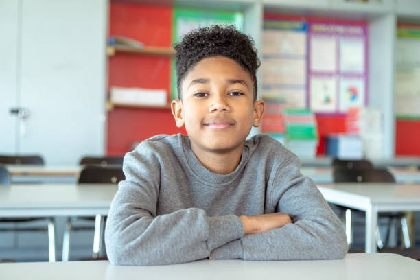 istock Multiracial adolescent boy at school 1389037738