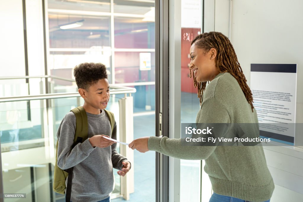 Turning In Student Turning In Assignment Before Class Starts Stock Photo ...