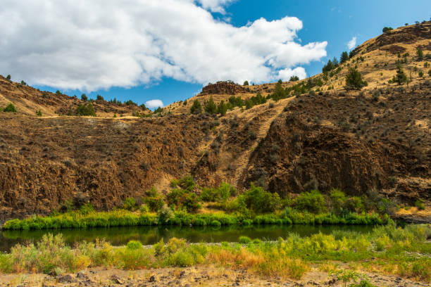 istock A quiet river in central Oregon runs along a cliff face 1389037971