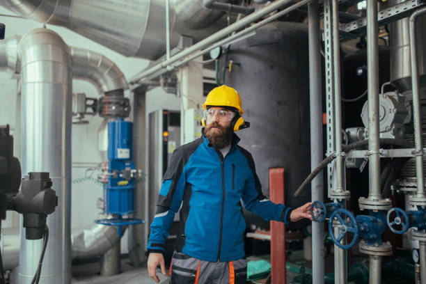istock The worker performs quality control and inspection of the heating system. 1389038356