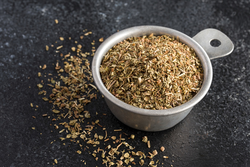 Dried Oregano Herb in a Measuring Cup