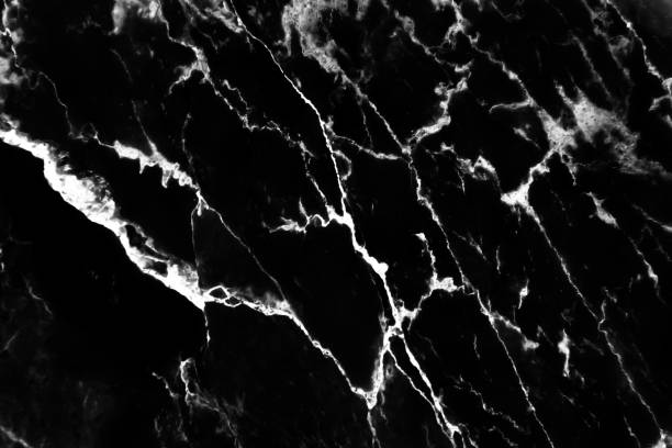 istock Dark black marble with white vein seamless patterns abstract floor background 1389051588
