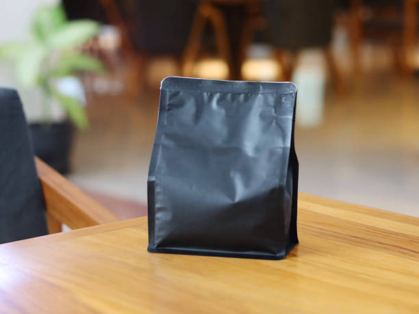 istock Photo of standing pouch coffee packaging on the cafe table 1389056648