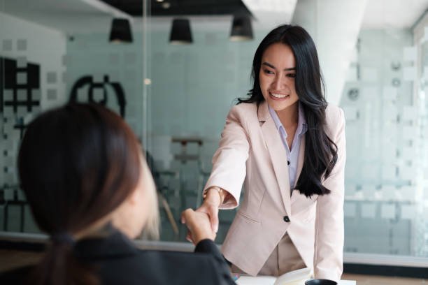 istock Business people successful negotiation and handshake. celebration partnership and teamwork, business deal concept. 1389057349
