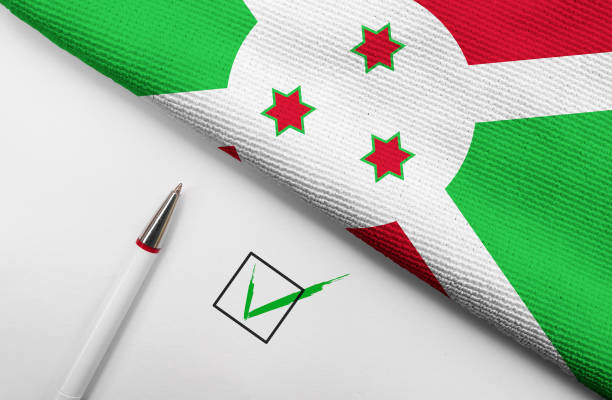 Football with waving flag of burundi isolated on white. 3D illustration