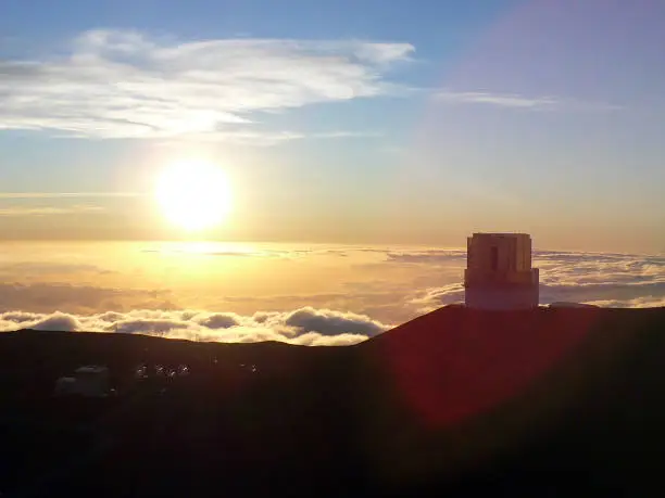 This view is the scene around the summit of Maunakea in Hawaii Island. This site is intense cold, but we can see a much beatiful sunset.