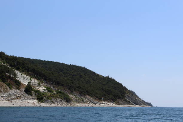 istock Rock formation over the sea. Summer hot day. 1389060390