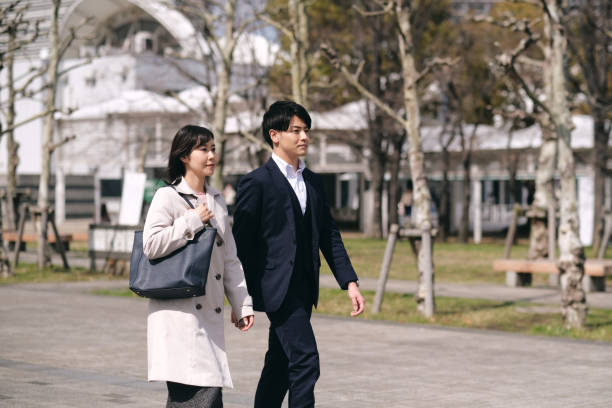 istock Coworkers walking on the street 1389063073