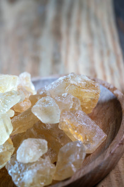 istock big brown sugar cane crystal on wooden table 1389065237