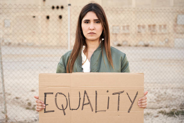 istock Woman and text Equality. Activist feminist protest. 1389066709