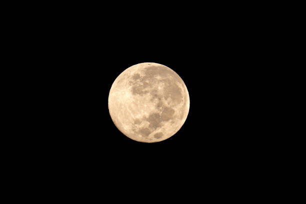 istock View of a full moon in a cloudless, clear sky 1389069102