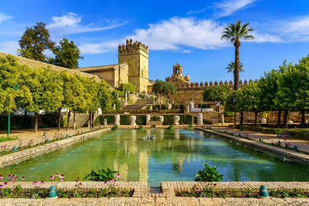 panoramic view of the impressive alcazar de cordoba and its royal gardens in andalusia, spain. - alcazar palace imagens e fotografias de stock