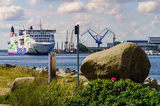 Rostock, Mecklenburg-Western Pomerania, Germany - June 14, 2020: A Stena line ferry passing Warnemuende on the way to Trelleborg