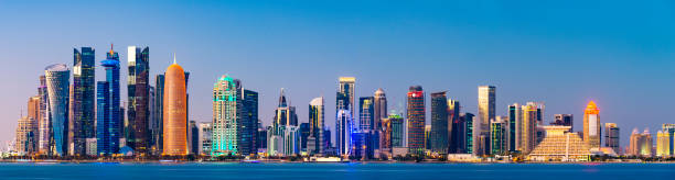 istock Panoramic View of the  Downtown Doha City Corniche Skyline at Twilight, Qatar 1389078161