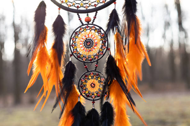 istock Handmade dream catcher with feathers threads and beads rope hanging 1389079370