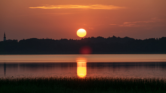 peaceful summer landscape on the lake at dawn, dusk, colors of the sky before sunrise, sunrise on the lake, Lake Burtnieki, Latvia