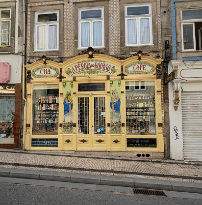 Porto, Portugal. March 2022.  the decorated facade of an old shop on a street in the city center