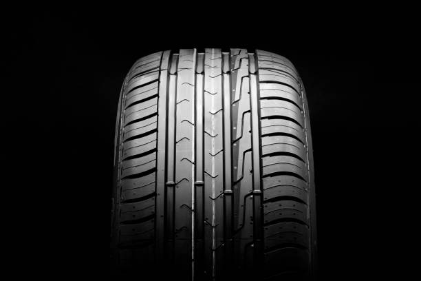 istock new economical eco-friendly summer tire on a black background, copyspace advertising space. 1389087450