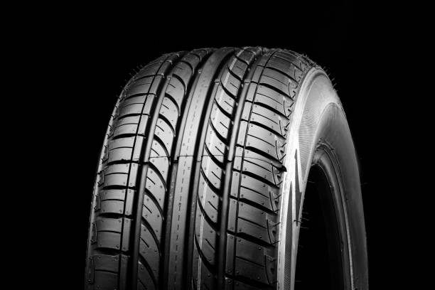 istock new economical eco-friendly summer tire on a black background, copyspace advertising space. 1389087480