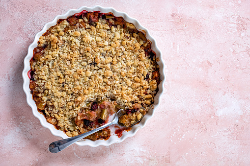 Delicious apple and blackberry crumble cake with oat